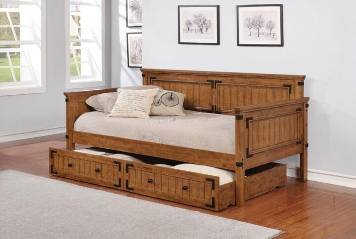 Follow the storied heritage of a mission motif. This earthy daybed provides a perfect alternative to a sofa in a family living space. Enjoy a rustic honey finish that sends warmth around a room and accommodates a variety of linen ensembles. Solid rubberwood construction shows off subtle metal trim pieces. Includes a 14-piece slat kit