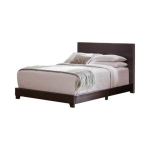 Create a sophisticated visual with the sleek lines from this leatherette upholstered bed frame. Neutral hues feature stitched details along the center