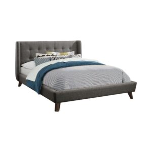 the frame is soft and welcoming. Subtle button tufting along the low headboard adds chic glamour to the craftsman's-like style. Full of structure