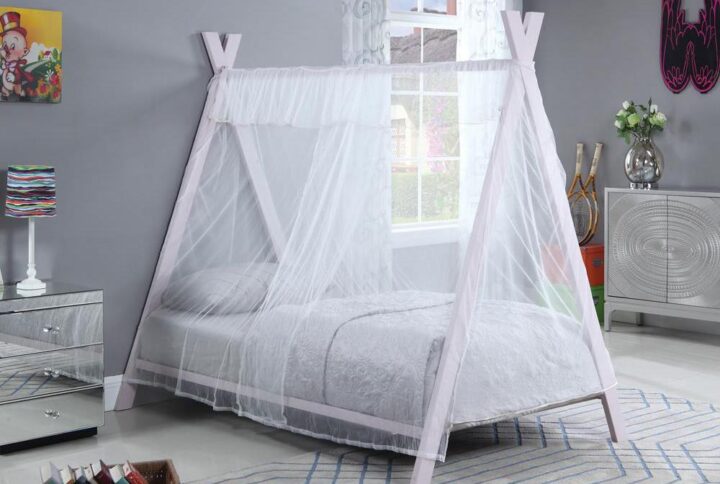 Create a playful aura in a child's room with this twin tent bed. The silhouette is full of elongated metal lines that crisscross to create a modern tent shape. Complete the charming contemporary style with a crisp pink finish and thin fabric details. Angled legs add depth to the center or corner of a room. Create an up-to-date spin on rustic charm with the soft