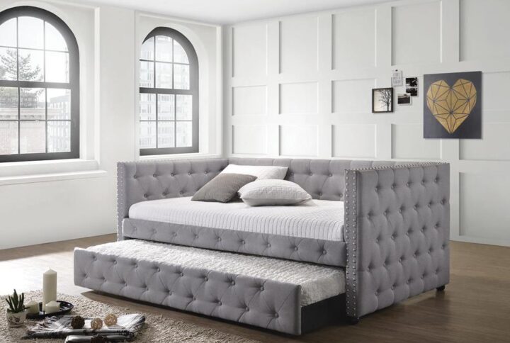 This bed's regal appearance belies its convenience and usefulness in hosting those extra house guests. The tufted surface pattern adds visual interest. The metallic-colored polyester finish makes this a design element you can place anywhere throughout the home. Use daily as a single bed or daybed for lounging