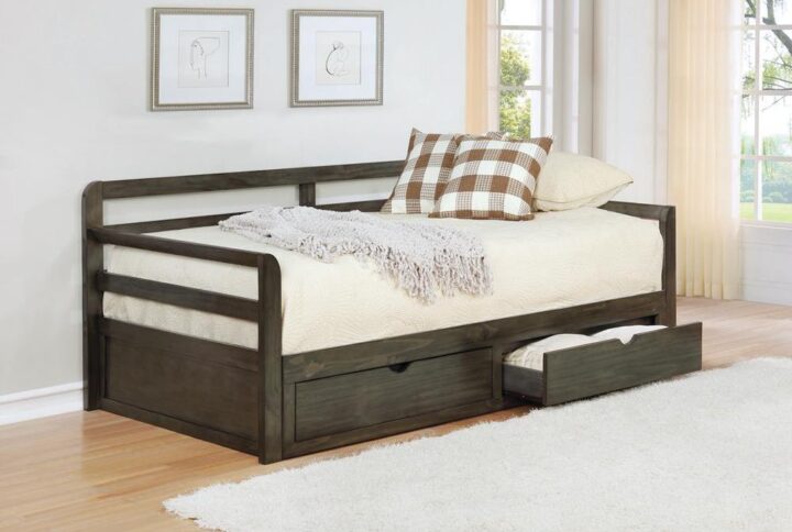 Bring function and fashion to your sleep space with this wood storage sleeper daybed. It is fashioned with pine