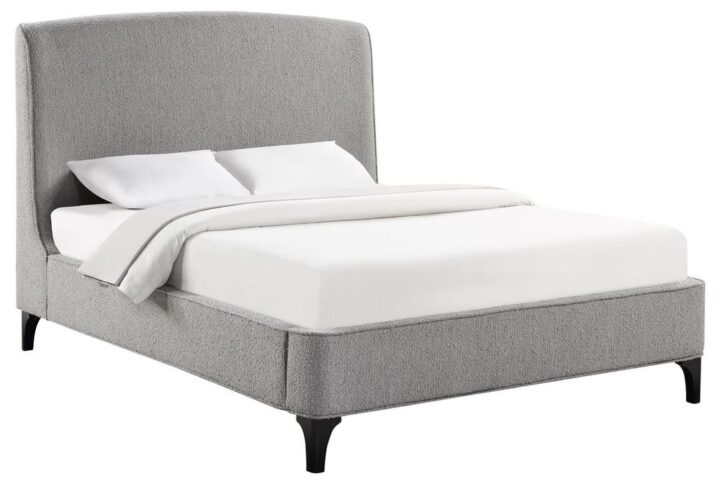Add a touch of style and comfort to your bedroom with this upholstered bed. Its gentle curved headboard and thick sides are padded with trendy grey chunky boucle fabric. The whole frame is covered in the same soft fabric