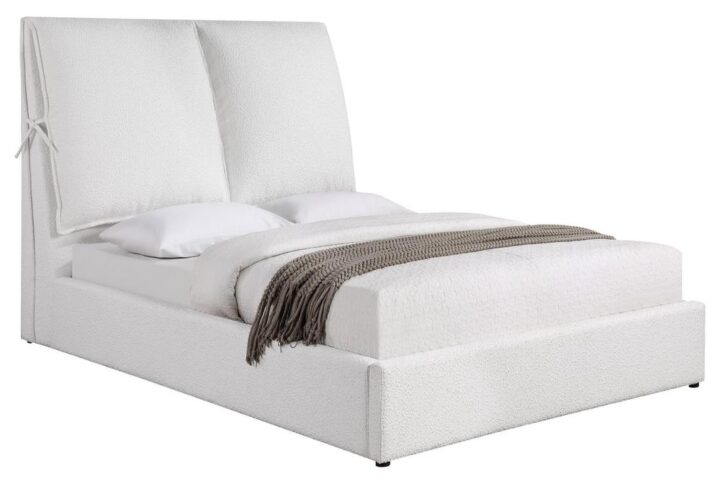 Get cozy with this plush upholstered bed