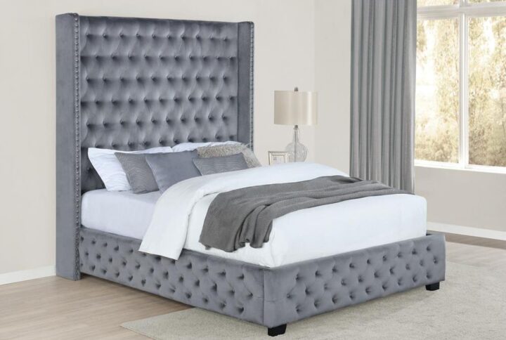 Choose to snooze in this exciting and elegant panel bed. A dramatically tall headboard with a modern wingback design takes the center stage of your bedroom. Entirely upholstered in luxurious velvet