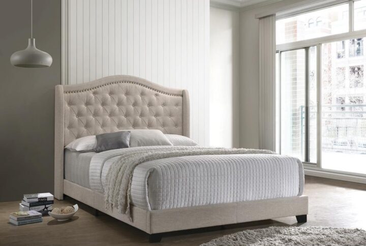 A tall and imposing headboard ups the drama factor for this Sonoma upholstered bed. Beautiful linen-like fabric wraps the headboard