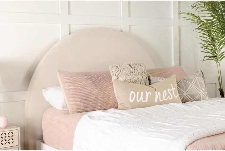 Add extra comfort to your elegant bedroom with this vintage-inspired transitional headboard