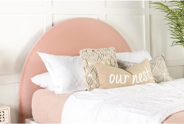 Add extra comfort to your elegant bedroom with this vintage-inspired transitional headboard