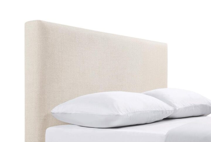 Smooth edges embellish the clean aesthetic of this modern headboard