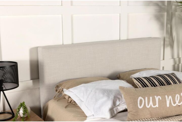 Smooth edges embellish the clean aesthetic of this modern headboard