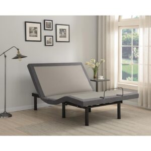 This adjustable bed base offers complete relaxation and support with various ergonomic positions.Upholstered in a two-tone off-white and grey upholstery