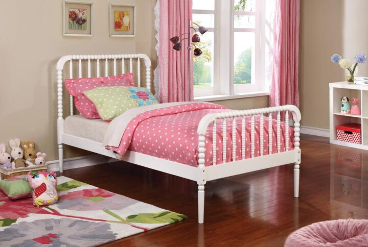 Complete a classic motif with the structure from this wooden twin bed frame. Bobbin-inspired