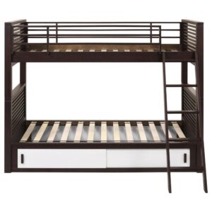 this stacked twin over twin bunk bed provides a striking contrast and ample sleeping arrangements for a shared sibling bedroom. Sliding doors offer a sleek hidden storage compartment tucked beneath the bottom bunk where you can organize bed linens and other personal items. An attached ladder reaches the top bunk
