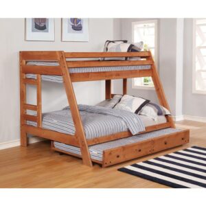 The Wrangle collection presents this rustic youth trundle bed that's a showpiece of any guest or youth bedroom. Climb up to the top sleeping space on the handy ladder at the ends of the bed. Top bunk features side slats to keep the sleeper safe and secure. Finished in amber wash for a bucolic appearance that looks great with any bedroom decor. Includes bunkie mattress for convenience.