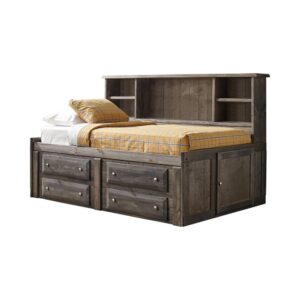 its cool gunsmoke finish adds a rustic appeal. Space-saving storage makes room for stashing linens and clothing in drawers situated at its base and door-covered compartments on each side. A bookcase headboard offers space for organizing and displaying books and decor. Make a statement in a teen's room with this stylish bed.