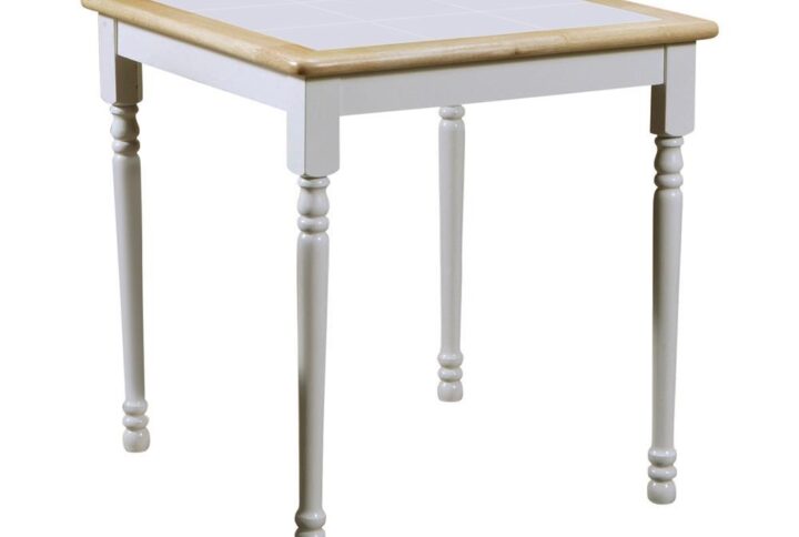 This dining table brings a new dimension to two-tone tables. Table top features white tiles that are bordered by natural brown wood finish. Legs are finished in white and offer slight curvy detailed carvings near the top and bottom. Table is crafted in Asian hardwood for staying power. Pull up a matching two-tone dining chair (not included) and enjoy a sandwich or engaging conversation.