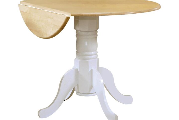 Your breakfast nook or dining area just got more attractive with this dainty dining table. Smooth round top has drop leaf for more intimate encounters. Pedestal base is thick and staunch. Four ornamental legs are elegantly curved for a distinctive pose. You'll find yourself lingering over morning coffee even on weekdays if you're not careful.
