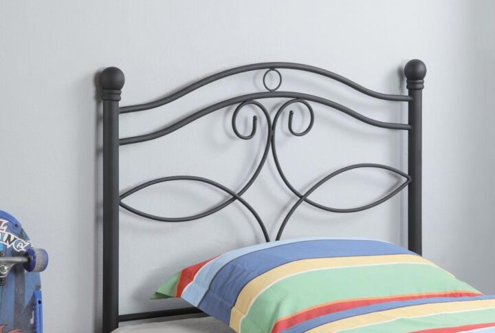 This metal twin headboard adds a sleek