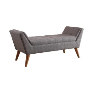 bench has a feathery touch. Relax in comfort on the soft tufted cushioned seating. Flared arms are a convenient armrest or backrest while watching TV or discussing life's curves. Flared legs cut a lively