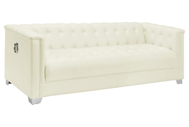 Gleaming ring handles impart glam flair in this modern living room seating set. Delivering a sofa