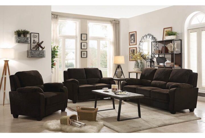 Celebrate the relaxing aura of casual comfort with this three-piece living room set. Padded arms welcome guests and family to the included sofa