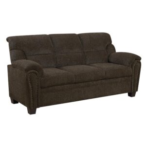 classic glamour to your living room. This sofa boasts a transitional design that looks lovely in any space. Its silhouette is sleek and simple with gracefully curved arms. Its beautiful upholstery is brought to life by elegant nailhead trim. Its seating is pleasingly soft and plush