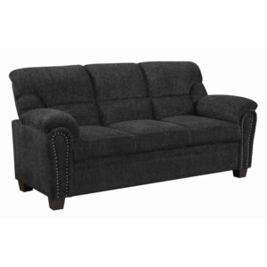 classic glamour to your living room. This sofa boasts a transitional design that looks lovely in any space. Its silhouette is sleek and simple with gracefully curved arms. Its beautiful upholstery is brought to life by elegant nailhead trim. Its seating is pleasingly soft and plush