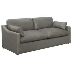 Gather friends and family in your living area around this stunning grey sofa. Down alternative seating ensures exceptional comfort for all guests. Deep seating and sloped track arms provide an exceptionally modern design. Upholstered in top grain leather