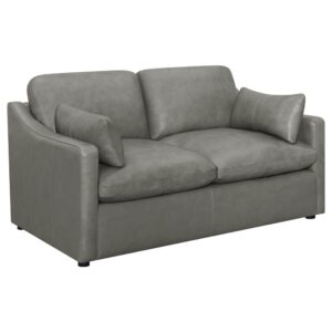 Upholstered in a grey top grain leather