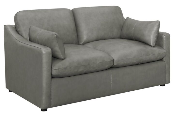 A stunning grey loveseat will create a cozy seating environment for friends and family. Luxuriously soft