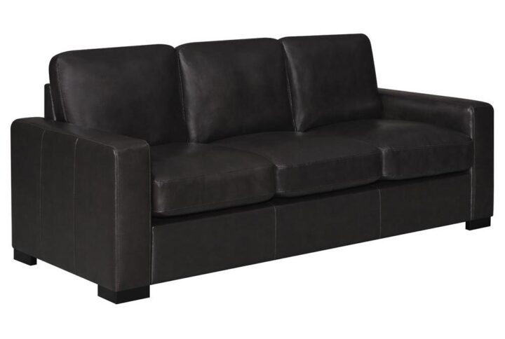 Immediately enhance the style and function of your living area with this dark brown sofa. Top grain leather provides a luxuriously soft feel for this piece