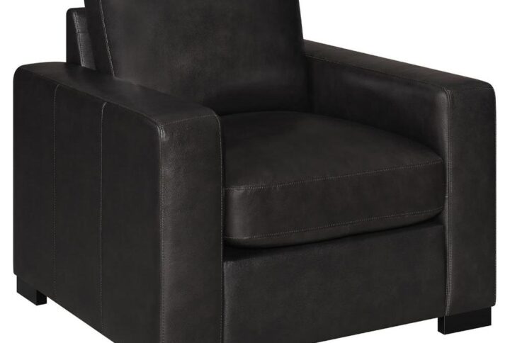 A modern style dark brown armchair is ready to enhance your living space. Made from luxuriously soft top grain fabric