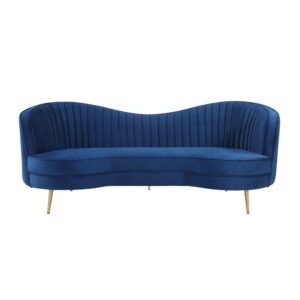 this retro-inspired sofa offers a striking curvy silhouette with a bold colored fabric. Wrapped entirely in a bright blue velvet that is super-soft to the touch