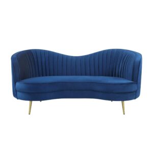 this Art Deco-inspired loveseat features a bright blue velvet upholstery set off with steel tapered legs. Contrasting the deep blue hue is a polished gold finish on each leg. Along with a channel tufted interior cushions and kidney-shaped silhouette