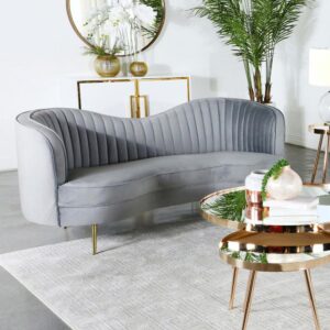 Transform a conventional space into a parlor-inspired retro room with this chic sculptural loveseat. Alluring curves infuse romance into a kidney-shaped loveseat created to become a focal point. This loveseat is fully encased in solid wood and covered in soft