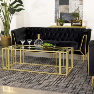 Gorgeous black velvet upholstery pairs with a sophisticated silhouette to bring lively energy to a modern glam upholstered sofa. Gold finish