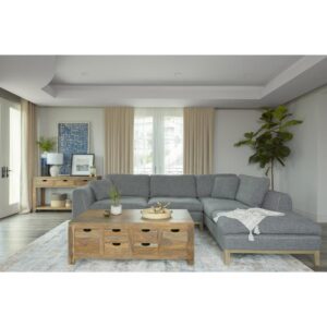 Add style to your space with this magnificent Mid-Century Modern sectional sofa. This low profile 2-piece sectional is exceptionally upholstered in a textured cool grey woven fabric accented with contrast blanket stitching in beige. Equally appealing is the beige platform base with tall tapered legs. On one end