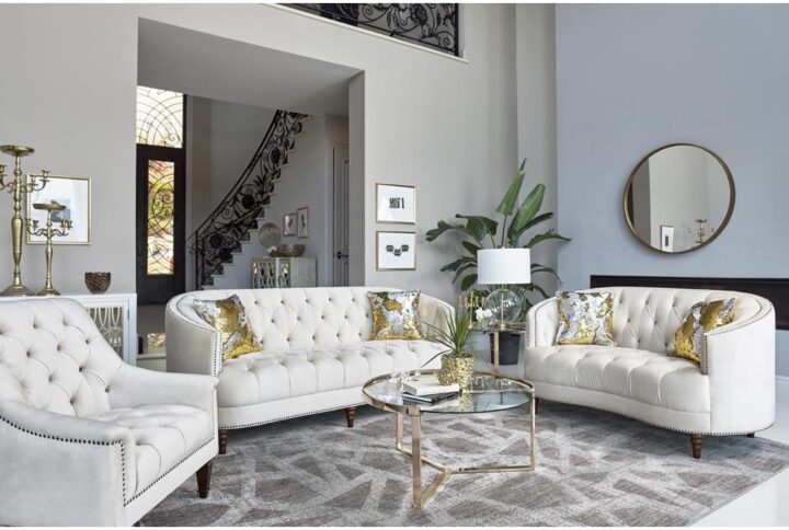 Elegance and glamour combine in this contemporary sofa and loveseat set