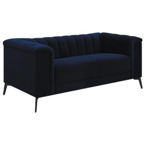 This elegant transitional loveseat will bring a palpable radiance to your home. It's upholstered in a vibrant navy blue matte velvet fabric that's so soft and stunning that you'll have to experience it to believe it. Whether you recline or sit