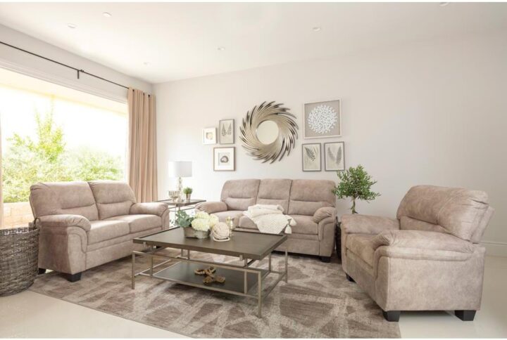 Relax and enjoy when you sit back in this contemporary three-piece living room set.Included is a sofa