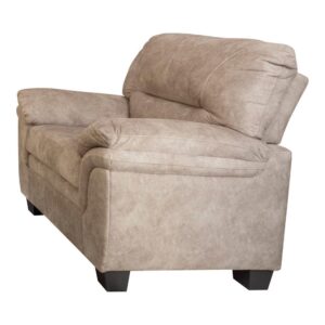 You'll love the delightful presence of this sumptuous transitional accent chair in your living space. Sinking into the plush high backrest and rest your elbows on the pillow top armrests. The chair is wrapped in an elegant beige velvet upholstery that's both comfortable and visually appealing. The extra cozy cushion makes for a pleasant seating experience no matter what you're up to. With a tufted seat back and tapered brown legs