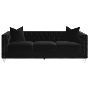 this contemporary sofa lends a refined look to living rooms and seating areas. Classic button tufted interior backrest and arms offer an elegant touch while gleaming individually hammered nailhead trim extends down each straight arm and across the bottom edge. Covered in a luxe black velvet that is soft to the touch