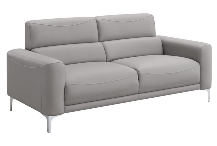 Each wrapped entirely in a soft taupe leatherette upholstery
