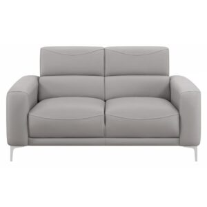 this loveseat is wrapped entirely in a soft taupe leatherette upholstery that complements numerous color palettes. With a clean and understated silhouette that features softly curved seats and backrests