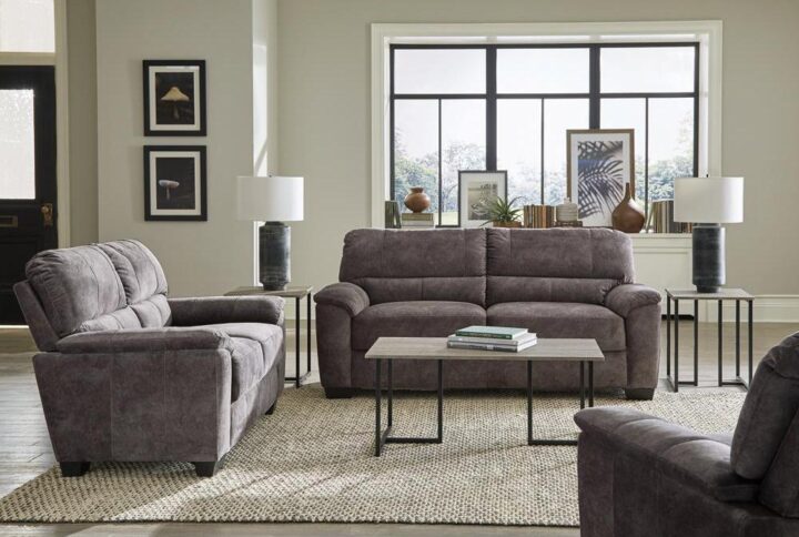 With a soft velvet upholstery in a neutral charcoal grey hue