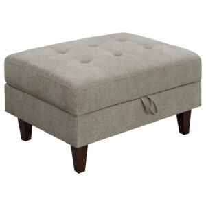 block wood feet are finished in dark brown as a complement. Sit comfortably or rest feet on a plush top