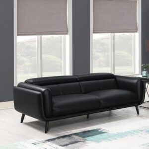 Make the most of tight living rooms with this sleek tuxedo-inspired contemporary sofa. Padded double track shelter arms embrace you as you kick back and unwind along the plush attached seat cushions and tall back. Slender flared legs present a retro throwback as a smooth black leatherette modernizes the mid-century modern frame design. Contrast cross-stitching and topstitching offer a finishing touch. A magnificent masculine-leaning sofa for modern homes.