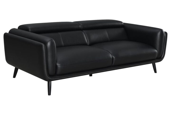 Complete your compact living room or entertainment area with this tuxedo-inspired contemporary sofa set. Sink into the plush attached seat cushions between padded double track shelter arms to relax at the end of a long day. Tall backs with lumbar support offer a comfy way to kick back too. Flared tapered legs in a dark brown finish peer out from beneath in a dramatic fashion