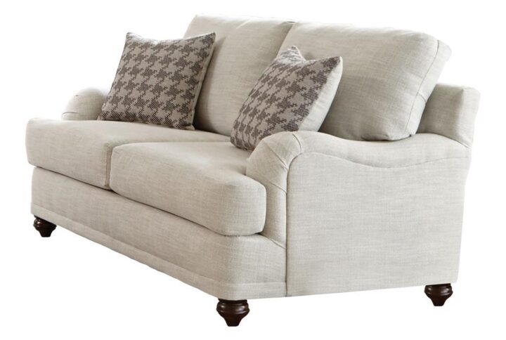 Give your living room or den a charming presence where friends and family feel at ease. This two-tone modern farmhouse loveseat helps confirm that everyone is always welcome. It features light grey linen-like reversible seat cushions