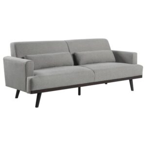 this attractive sofa is a superb choice for modern spaces. Outfit a living room or family room with the soft yet simple design of a sofa with a hint of mid-century minimalism. Wrapped in cool sharkskin upholstery